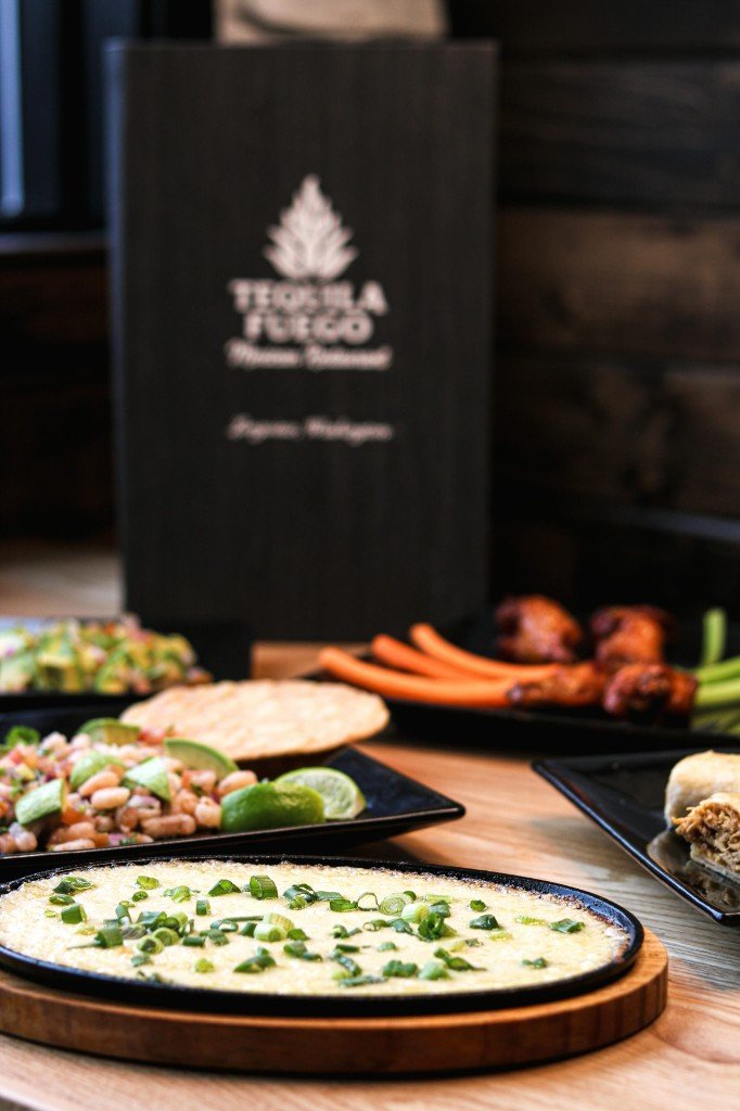 Crispy chicken taquitos with guacamole, shredded lettuce and crema at Tequila Fuego Longview